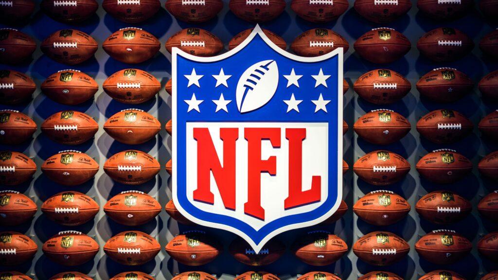 NFL logo around footballs